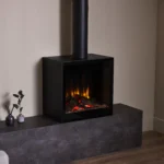 British Fires Cube Glass Door on plinth w:chimney angle British Fires Cube Glass Door on plinth w:chimney angle